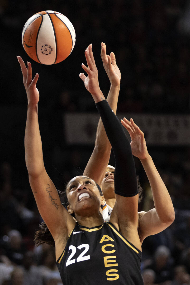 Phoenix Mercury forward Brianna Turner (21) shoot against Las Vegas Aces forward A'ja Wilson (2 ...