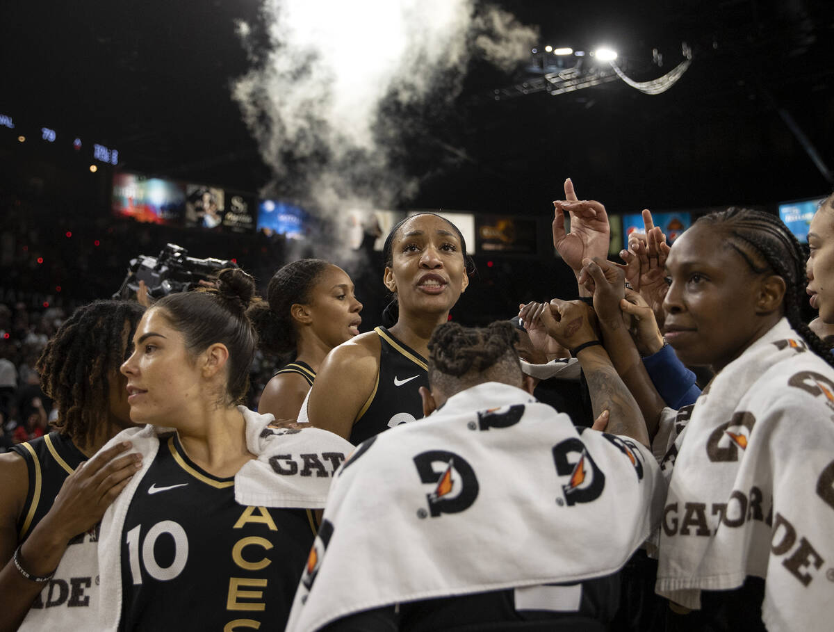 The Las Vegas Aces come together after winning a WNBA playoff basketball game against the Phoen ...