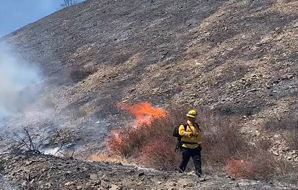 Crews battle the Bronco Fire near Cajon Pass in California on Wednesday, Aug. 17, 2022. (Caltra ...