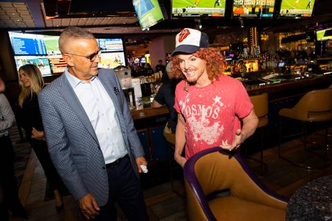 Carrot Top, right, chats with Anton Nikodemus, president and chief operating officer of The Cos ...
