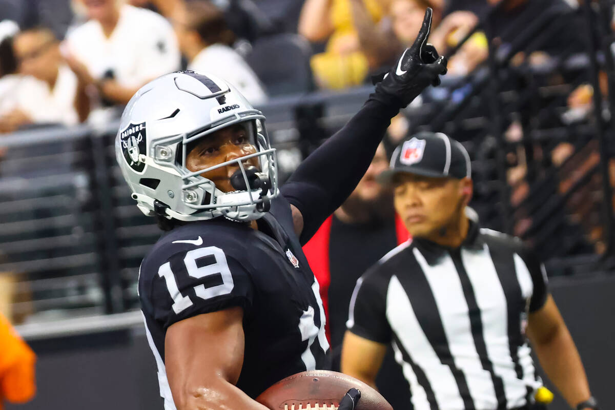 Raiders wide receiver DJ Turner (19) scores a touchdown against the Minnesota Vikings during th ...