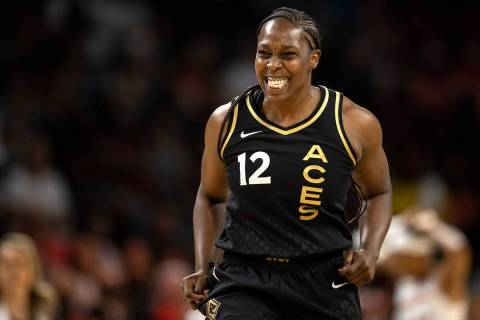 Las Vegas Aces guard Chelsea Gray (12) reacts to a missed shot during the first half of a WNBA ...