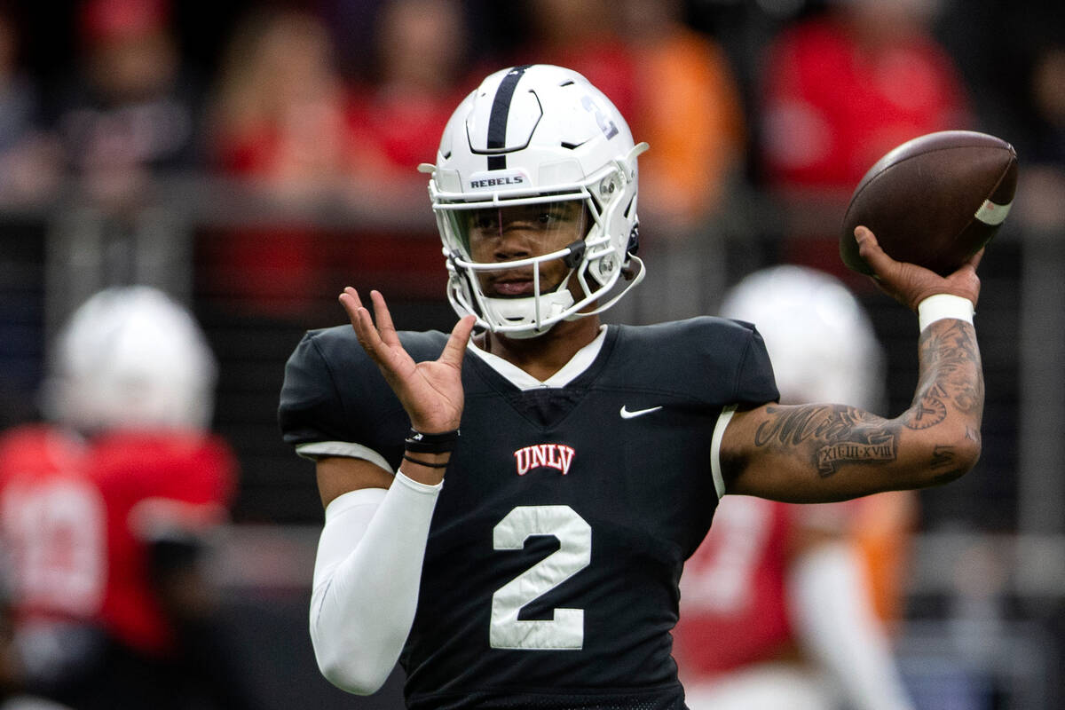 UNLV Rebels quarterback Doug Brumfield (2) passes during warmups before a UNLV spring scrimmage ...