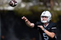 UNLV's Harrison Bailey (5) throws a pass during a team football practice at UNLV in Las Vegas, ...