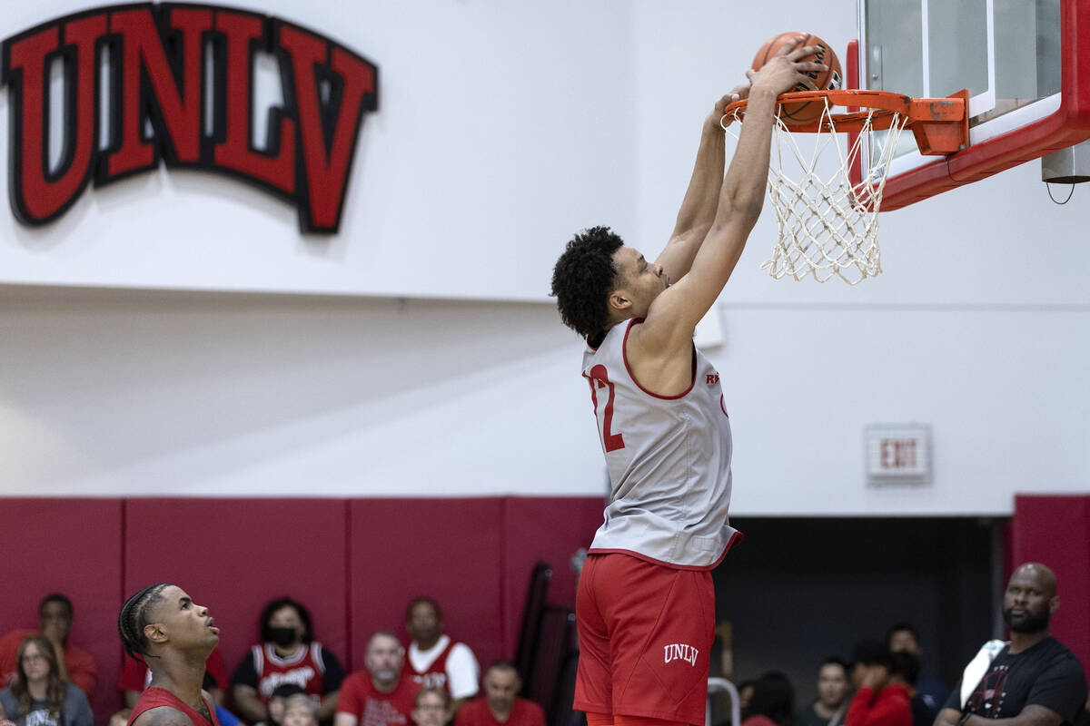 UNLV Rebels center David Muoka (12) dunks during UNLV men's basketball’s final practice ...