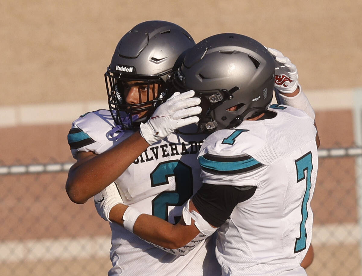 Silverado High School's Donavyn Pellot (2) celebrates his touchdown with his teammate Bryson Tu ...