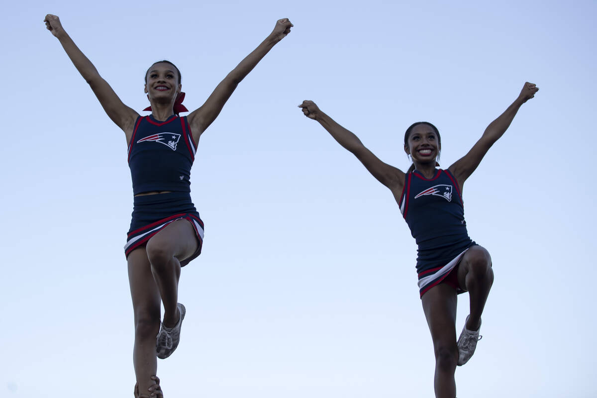 Liberty cheerleaders do stunts during a Class 5A high school football game against Palo Verde a ...
