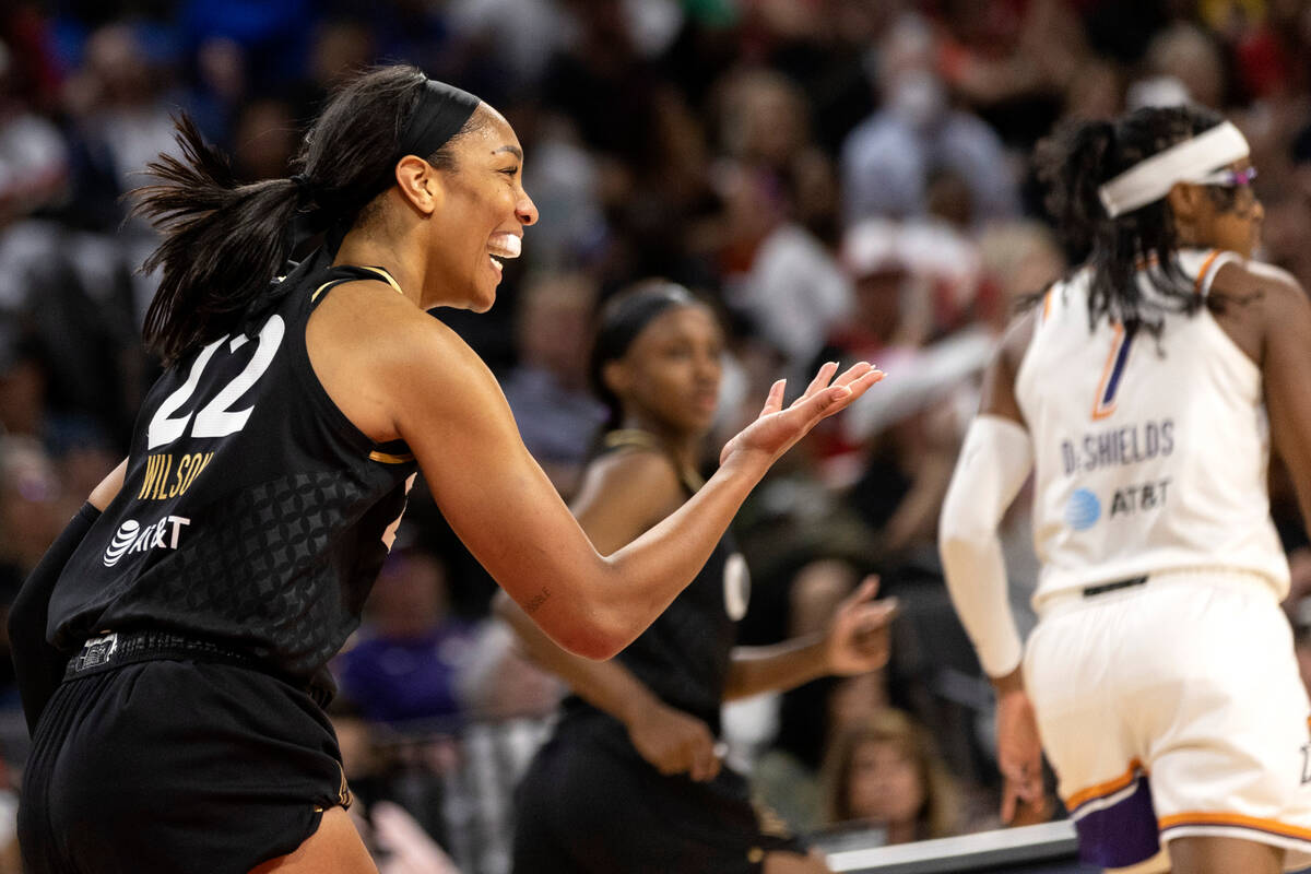Las Vegas Aces forward A'ja Wilson (22) celebrates after scoring during the first half of a WNB ...