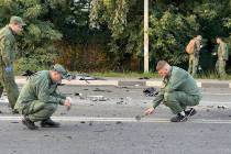 In this handout photo taken from video released by Investigative Committee of Russia on Sunday, ...