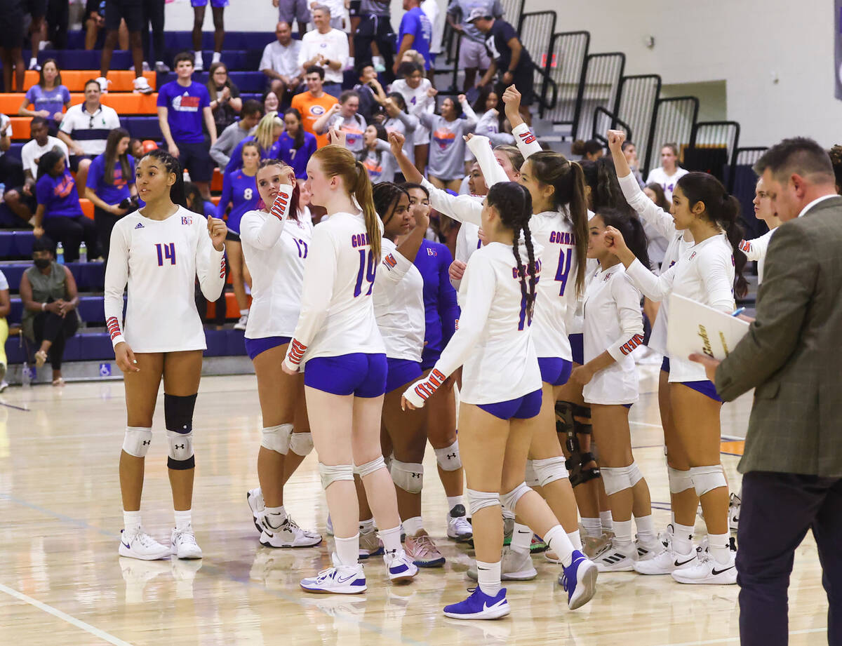 Bishop Gorman players celebrate after defeating Centennial in a volleyball game at Bishop Gorma ...