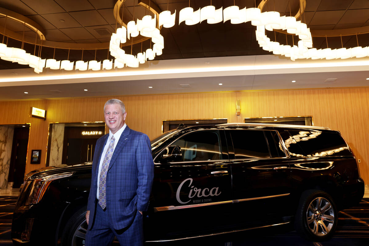 CEO Derek Stevens with a Cadillac Escalade in the pre-function area at the new meetings and con ...