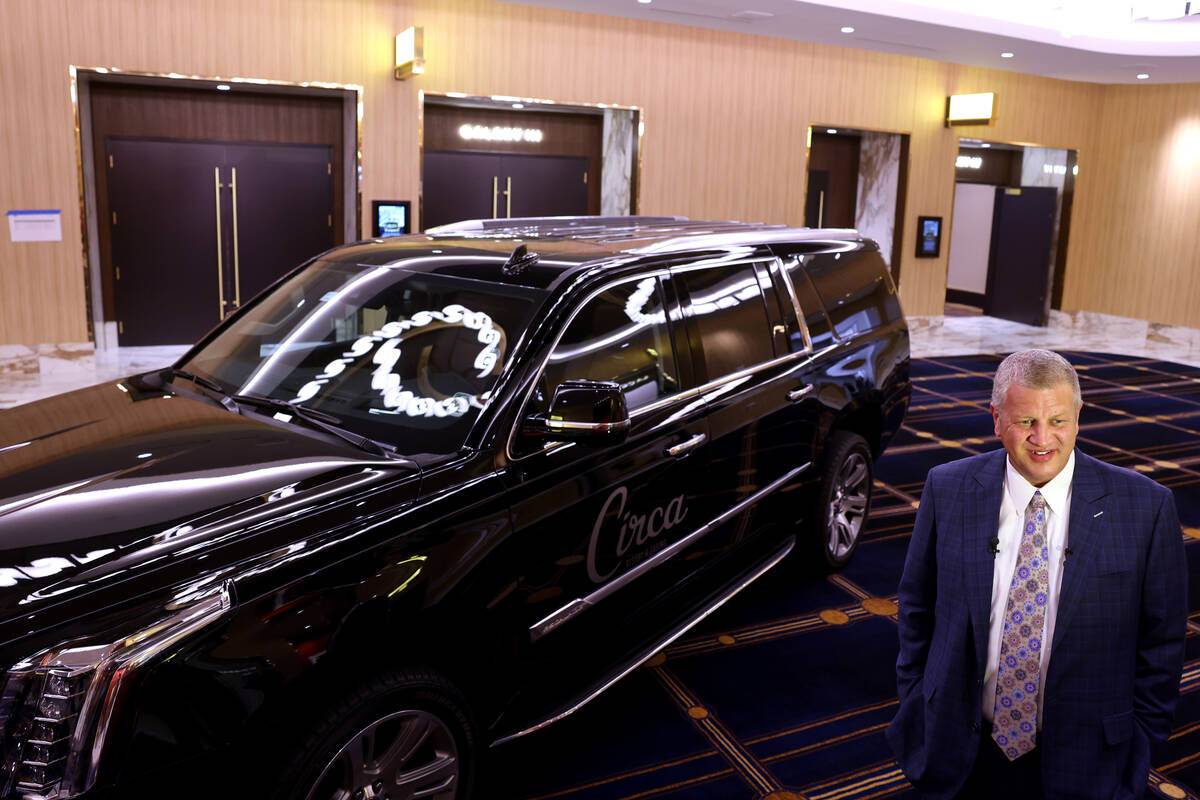 CEO Derek Stevens with a Cadillac Escalade in the pre-function area at the new meetings and con ...