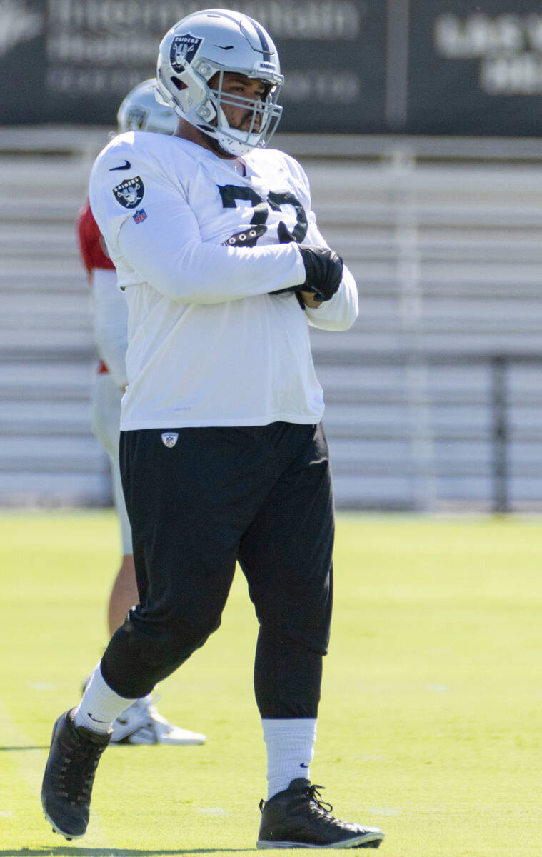 Raiders offensive lineman Jermaine Eluemunor (72) on the field during the team’s trainin ...