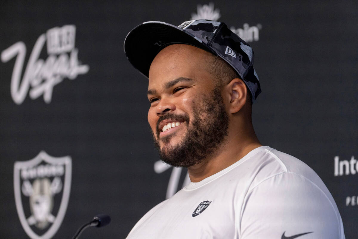 Raiders offensive lineman Jermaine Eluemunor answers questions during a news conference after t ...