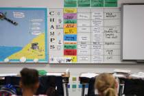 Expectations and rules for students are posted in the front of Steve Armitage’s 5th grad ...
