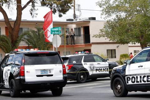 Las Vegas police investigate around the 4100 block of Pennwood Avenue on Aug. 9, 2022, in Las V ...