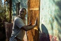 This image released by Universal Pictures shows Idris Elba in a scene from "Beast." ( ...