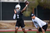 UNLV's Doug Brumfield (2) throws a pass during a team football practice at UNLV in Las Vegas, S ...
