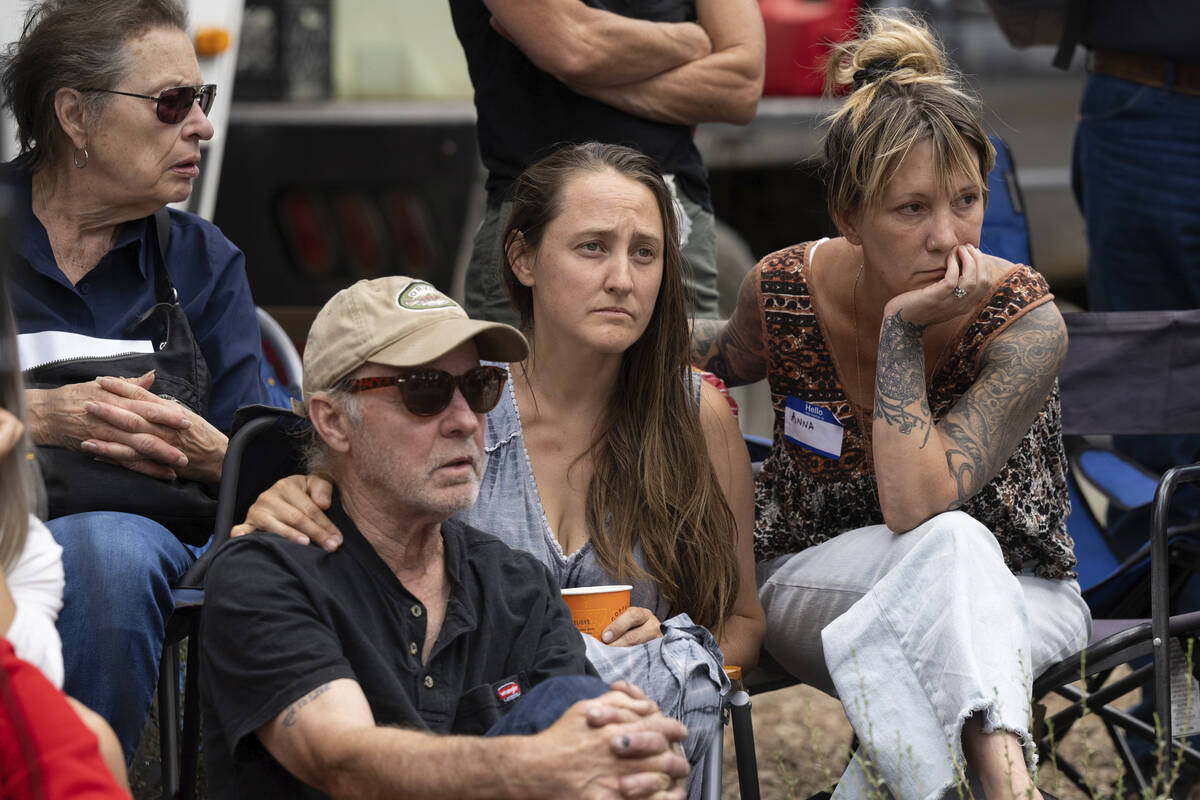 Lindsey Rodni-Nieman, center, mother of missing 16-year-old Kiely Rodni, listens to law enforce ...
