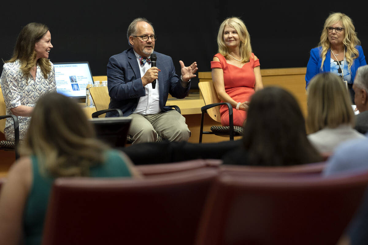 Officials participate in a panel about projects planned for the development of the Las Vegas Me ...