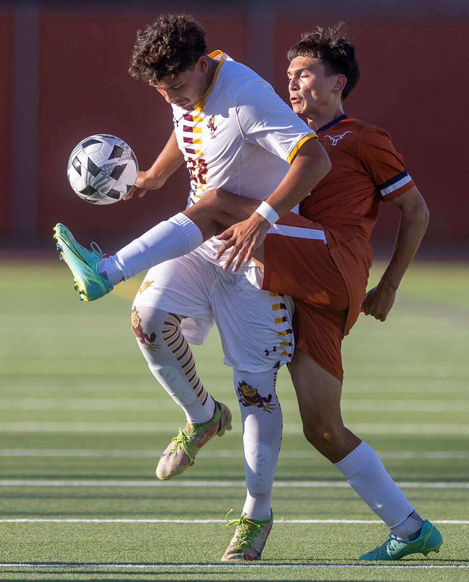 Eldorado midfielder Angel Reveles De La Cruz (22) advances the ball with Legacy forward Angel N ...