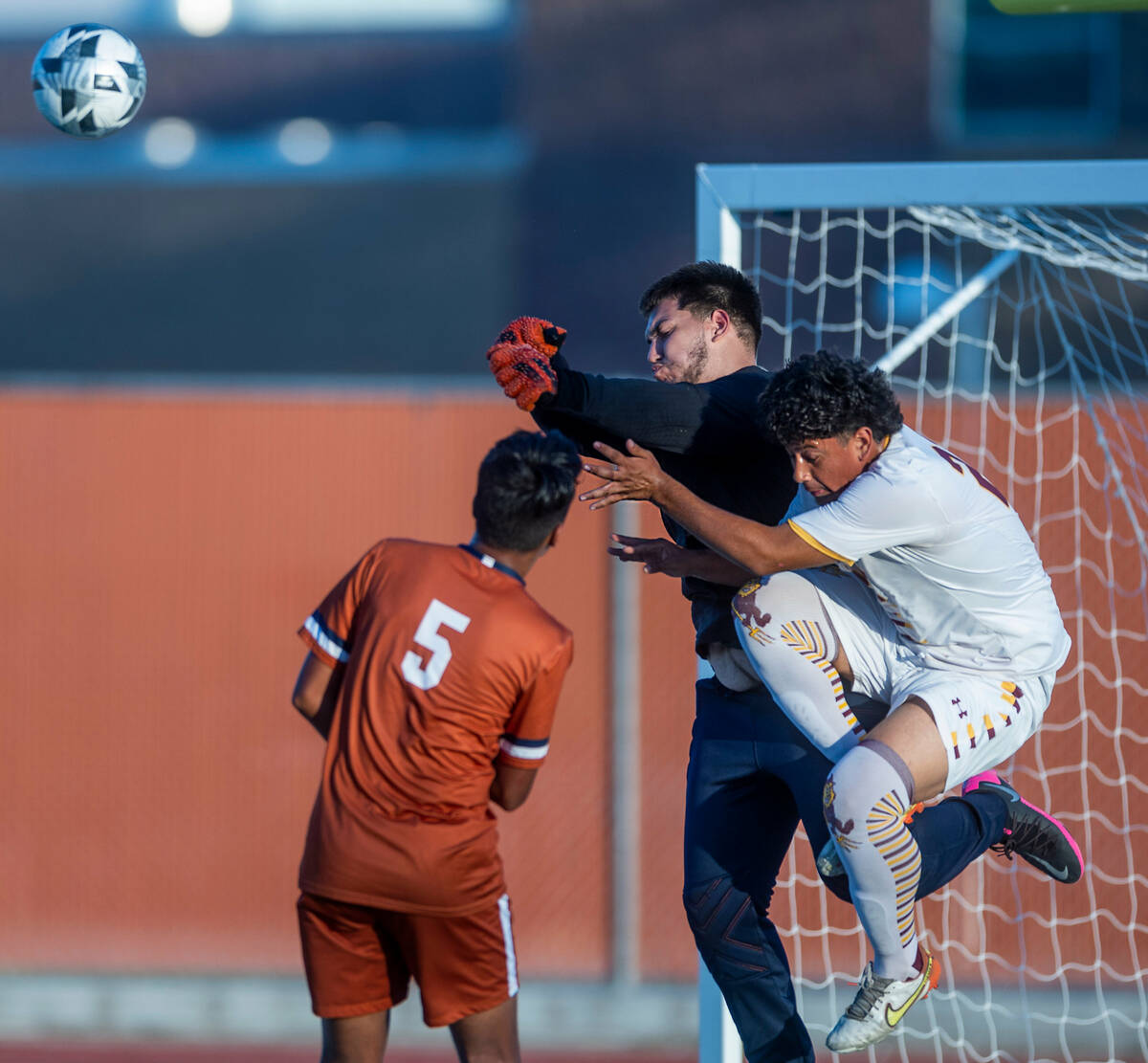Legacy goalkeeper Angel Rodriguez-Torres (2) knocks away the ball from Eldorado striker Eric Ho ...