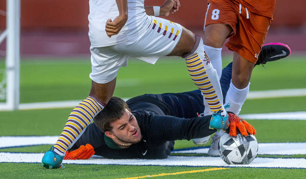 Legacy goalkeeper Angel Rodriguez-Torres (2) grabs the ball after a scoring attempt by Eldorado ...