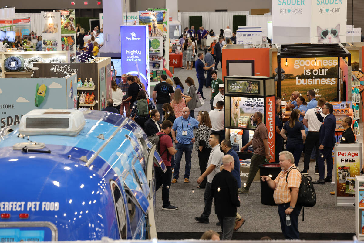 Conventioneers walk the show floor during the SuperZoo pet industry trade show at Mandalay Bay ...