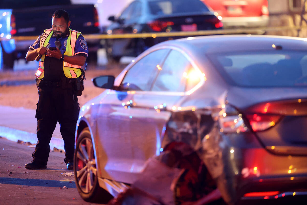 North Las Vegas Police Officer Andy Navarro, a fatal traffic investigator, at the scene of a hi ...