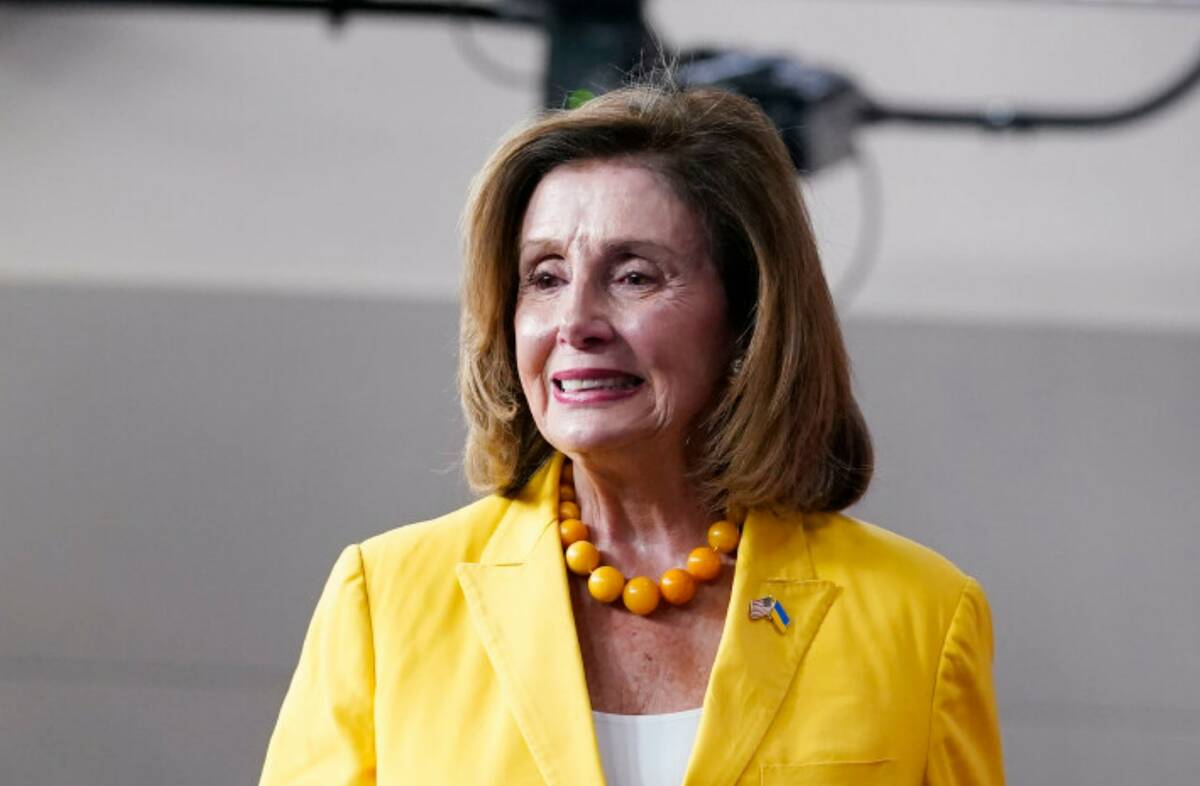 House Speaker Nancy Pelosi of Calif., arrived at her weekly press conference on Capitol Hill, F ...