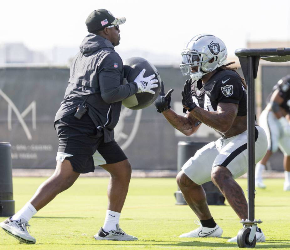 Raiders running back Brandon Bolden (34) works through a drill during the team’s trainin ...
