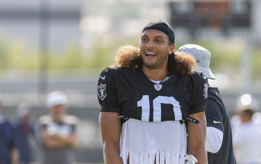 Raiders wide receiver Mack Hollins (10) smiles during the team’s training camp practice ...