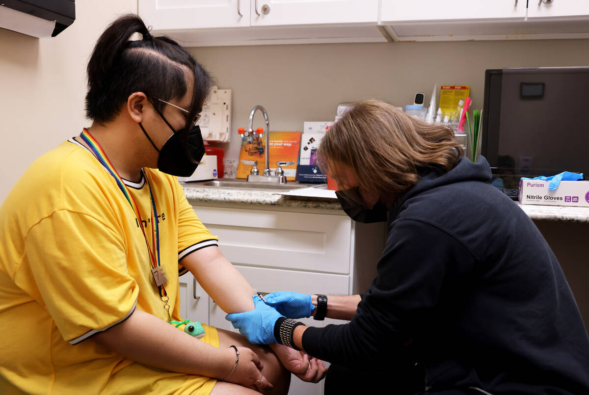 Phil Castillo receives the monkeypox vaccine from registered nurse Christopher Hansen at the Ar ...