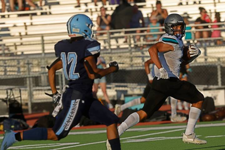 Silverado High School's Donavyn Pellot (2) runs into the end zone for a touchdown as Centennial ...