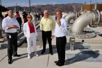 Nevada Gov. Steve Sisolak, second from right, tours the Southern Nevada Water Authority new low ...