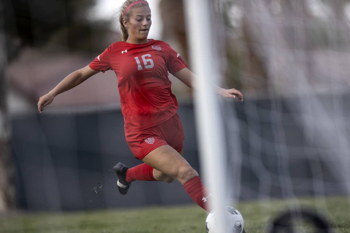 Arbor View’s Isabella Srodes (16) kicks toward the goal during a girls high school socce ...