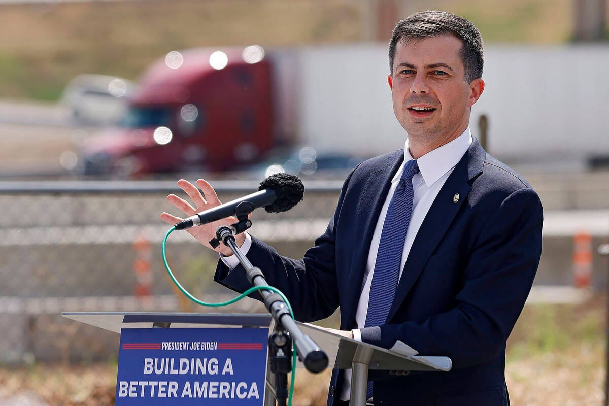 In this Aug. 23, 2022, photo, Secretary of Transportation Pete Buttigieg speaks during a news c ...