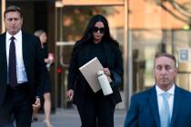 FILE - Vanessa Bryant, center, the widow of Kobe Bryant, leaves a federal courthouse in Los Ang ...