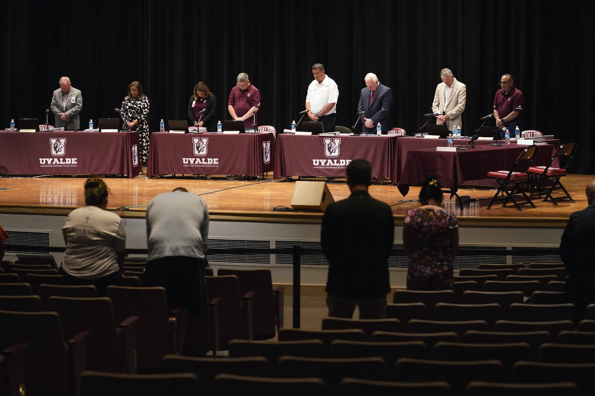 Dr. Hal Harrell, center, and members of the Board of Trustees of Uvalde Consolidated Independen ...