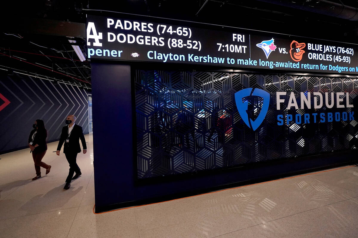 In this Sept. 9, 2021, file photo, guests arrive at FanDuel Sportsbook inside Footprint Center ...