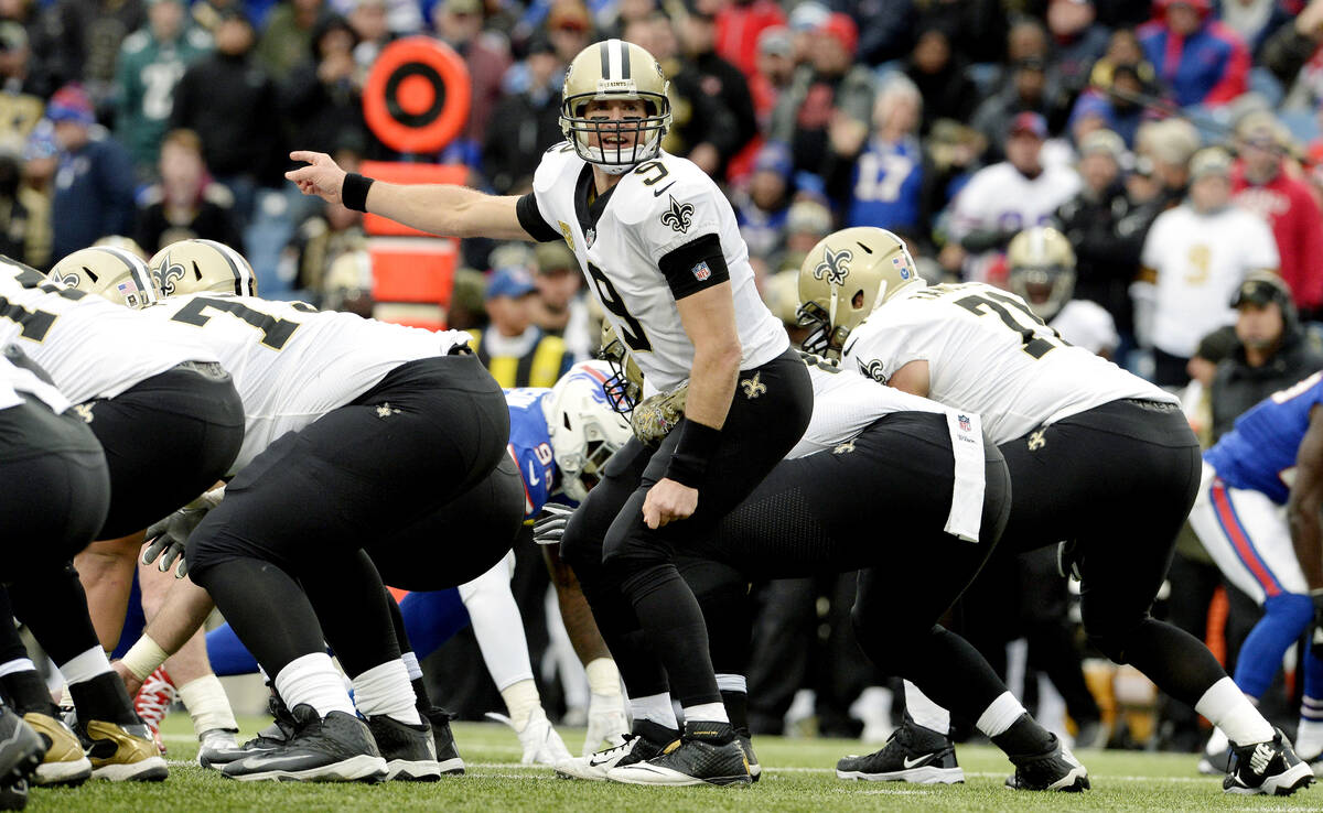 New Orleans Saints quarterback Drew Brees (9) calls out the defensive formation during the seco ...