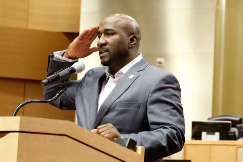 Las Vegas City Councilman Ricki Y. Barlow salutes after announcing his resignation during a pr ...