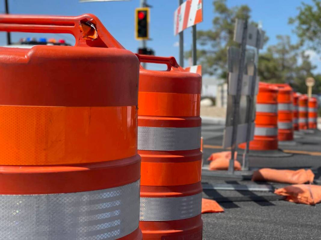 Road construction sign and barrels line Polaris Avenue on Aug. 26, 2022. (Mick Akers/Las Vegas ...