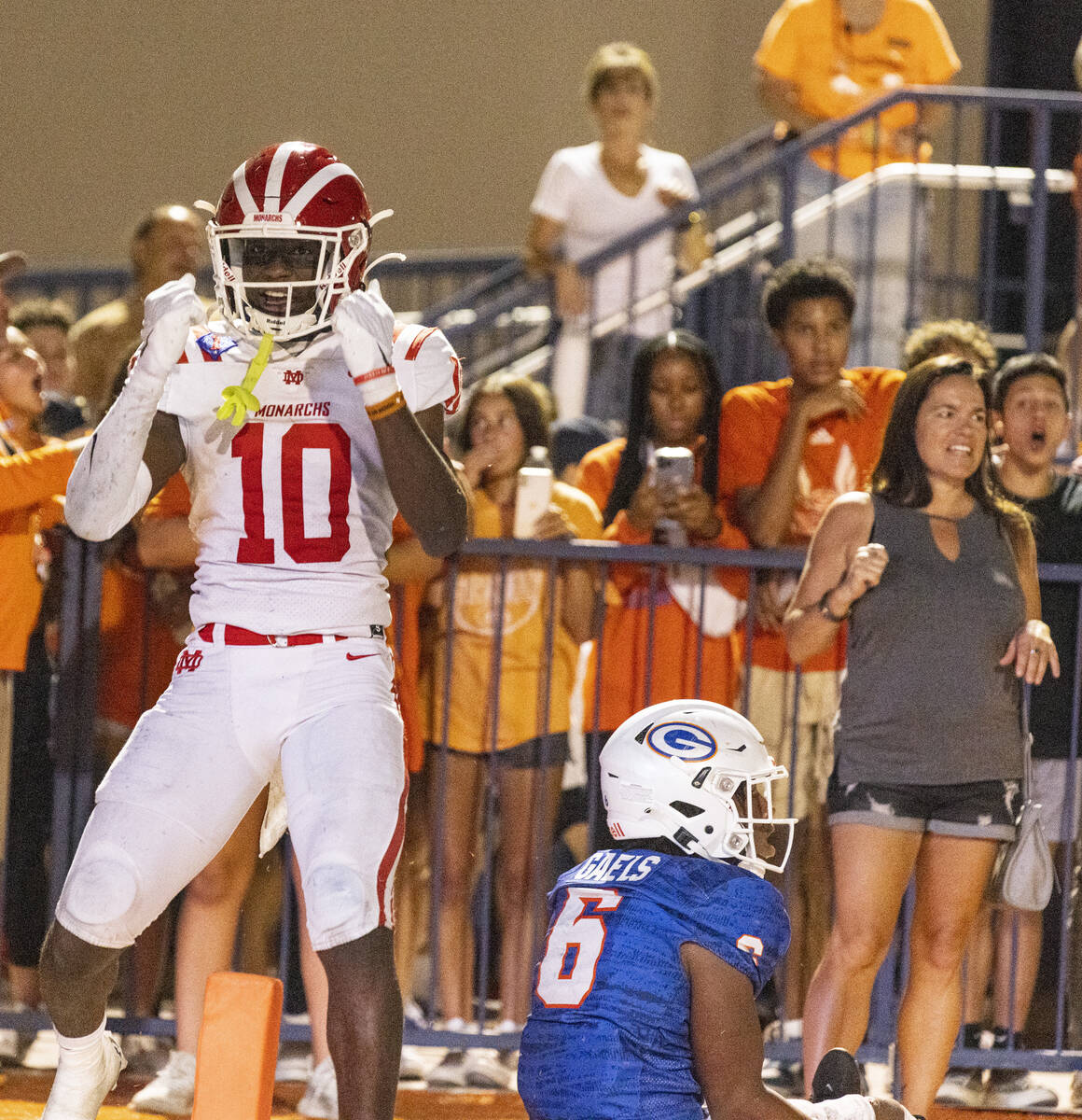 Mater Dei's wide receiver Marcus Harris (10) celebrates his touchdown as Bisho Gorman's defens ...