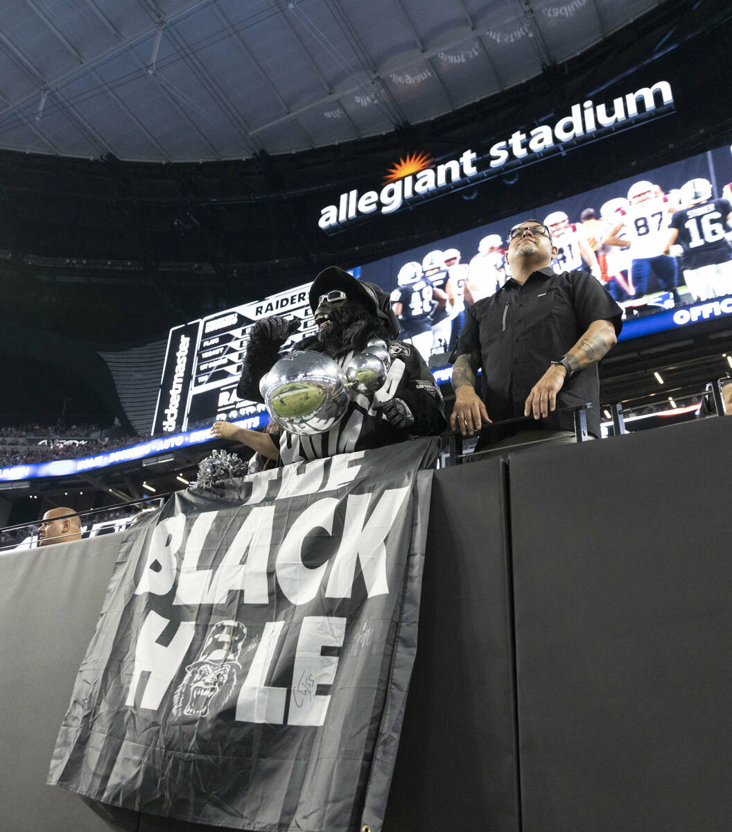Raiders’ fan Mark Acasio, known as Gorilla Rilla, cheers during the second half of an NF ...