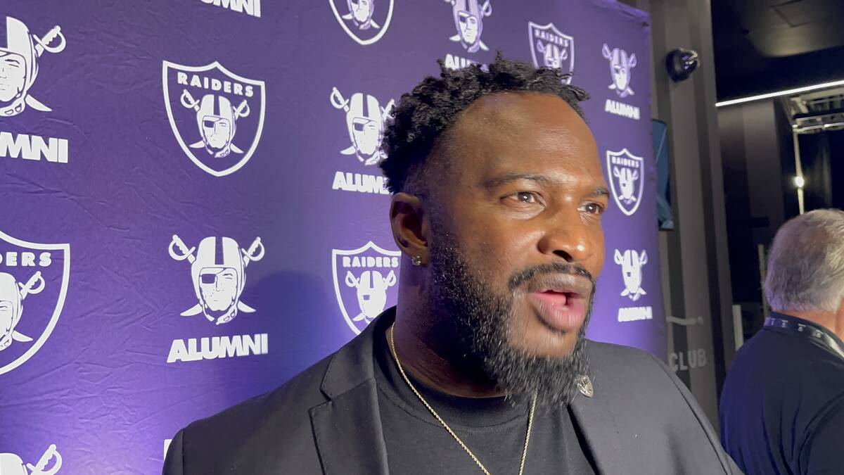 Marcel Reece, Raiders senior vice president, chief strategy officer talks to media during a gat ...
