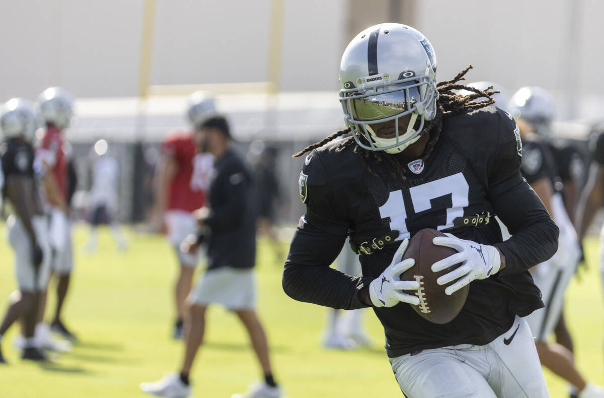 Raiders wide receiver Davante Adams (17) makes a catch during the team’s training camp p ...