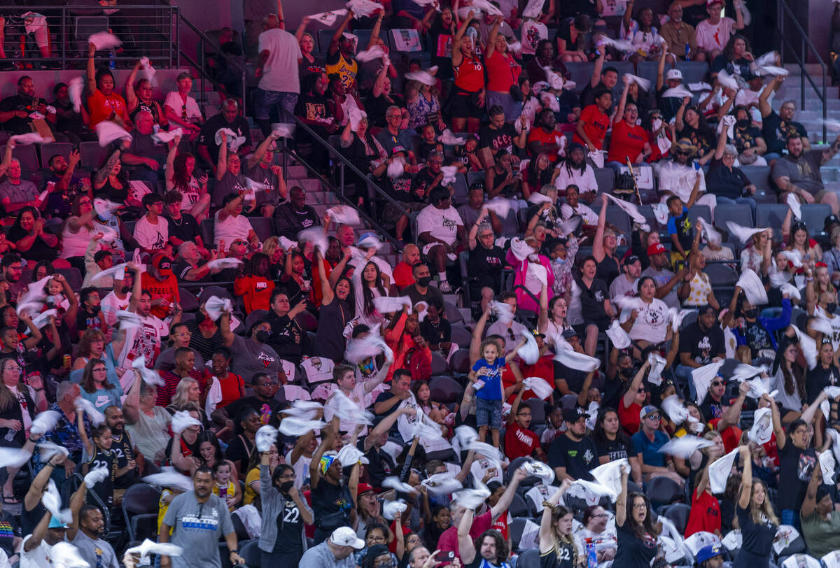 Aces fans wave their towels on a Seattle Storm free throw attempt during the first half of thei ...