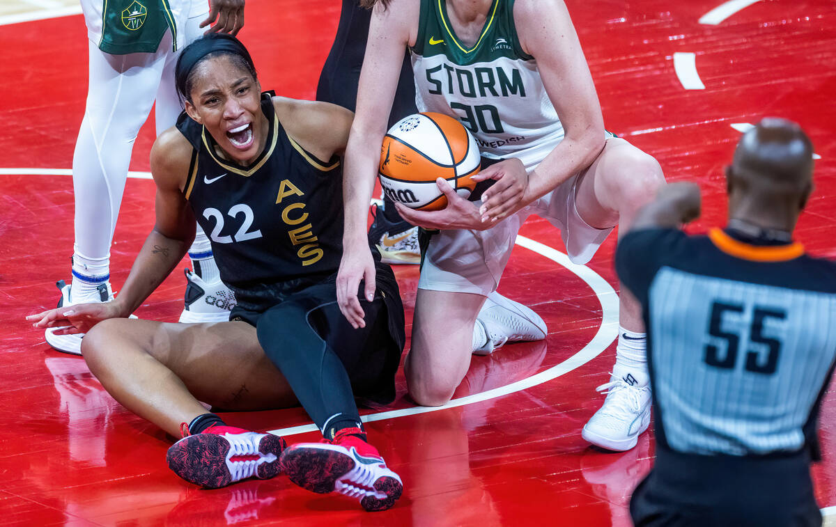 Las Vegas Aces forward A'ja Wilson (22) is upset about a jump ball call instead of foul with Se ...