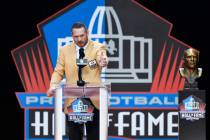 In this Aug. 4, 2018, file photo, former NFL player Brian Urlacher delivers his speech during i ...